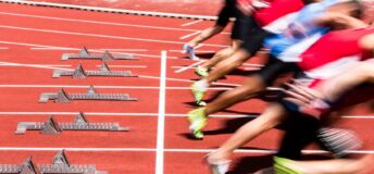 Photo of athletes starting to sprint.
