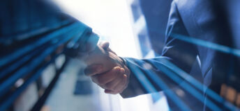 Two businesspeople shaking hands