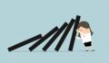Illustration of a businesswoman fighting back against an economic downturn.